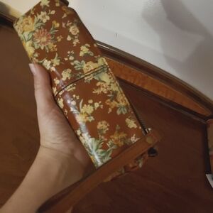 Two P. NASH leather pencil cases